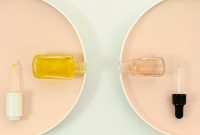 make-up-bottles-with-pipettes-beige-white-background_23-2148320923